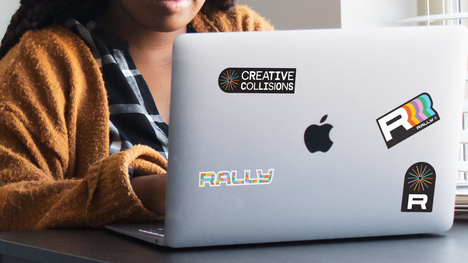 rally conference 2023 stickers on laptop